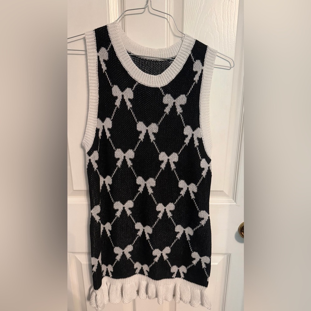 Sleeveless Bowknot Ruffle Hem Sweater Dress, size large.